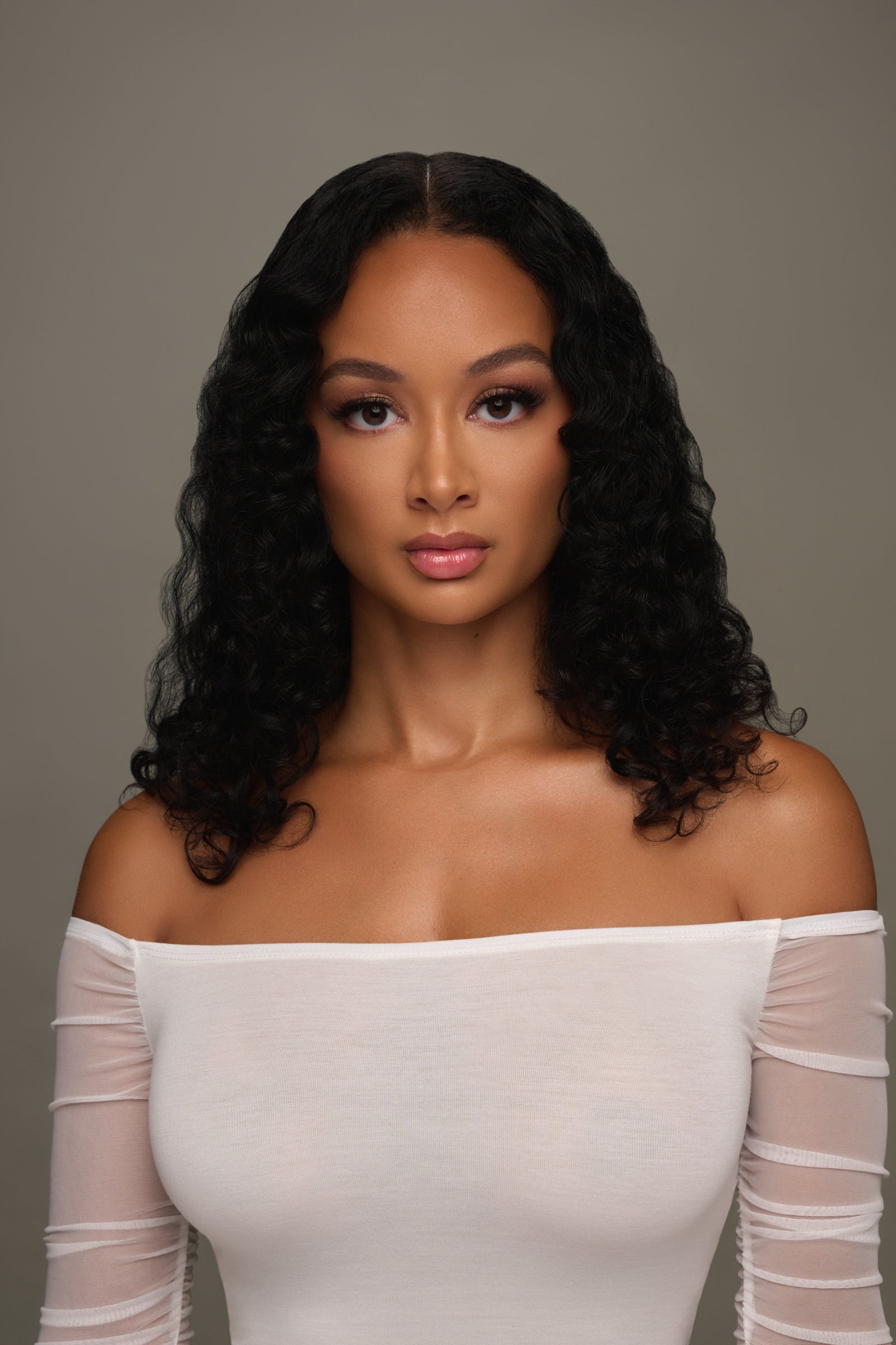 Draya Michele Wavy Curl Seamless Virgin Clip in Extensions