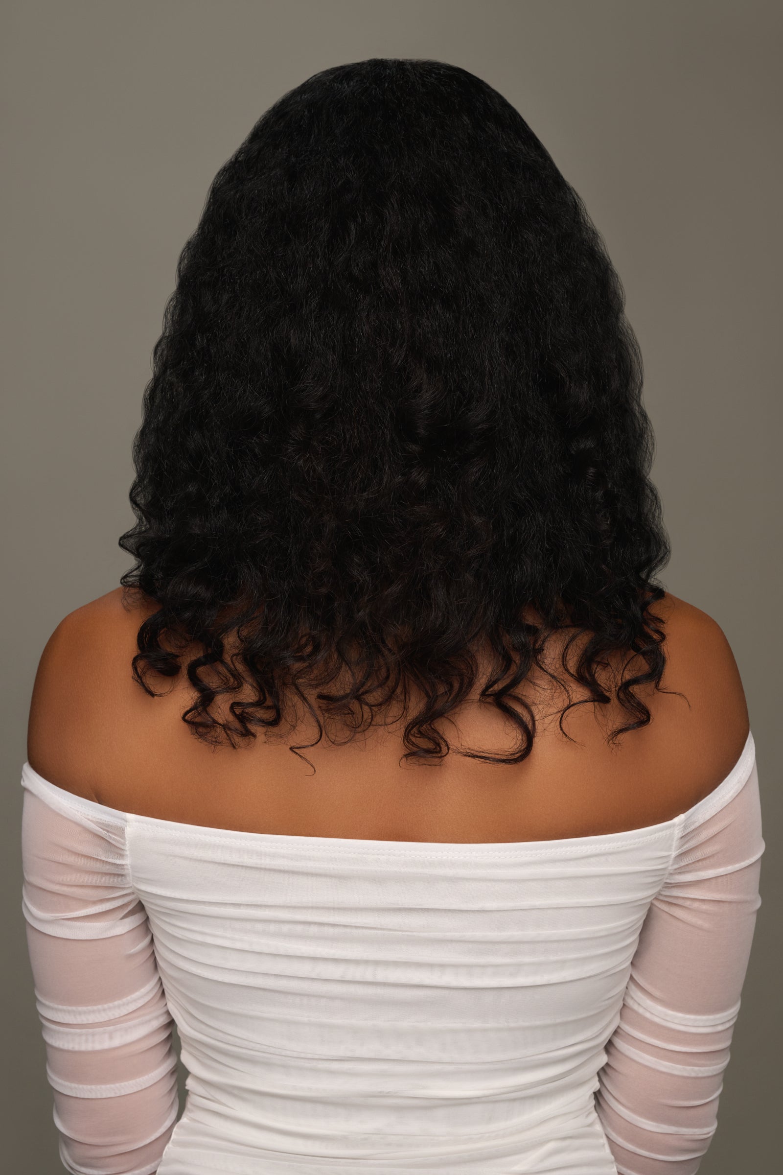 Draya Michele Wavy Curl Seamless Virgin Clip in Extensions